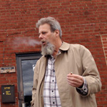 Butch Willis smoking outside Inner Ear Studios Arlington Virginia